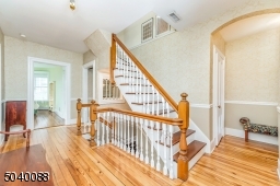 Stairs to 3rd floor for bonus rooms and attic walk-in storage