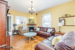 Wood burning fireplace, wood mantle with tile surround