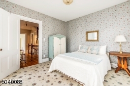 Single closet, wall to wall carpet