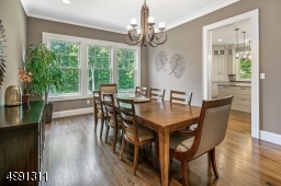 A triple window invites the outdoors in for formal gatherings
