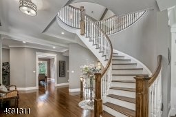 Hickory hardwood floors begin here and continue throughout.