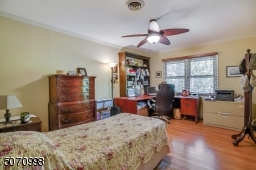 There is hardwood flooring throughout this fine home.