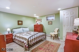 Located on the lower level for privacy. There is a full bathroom close by.