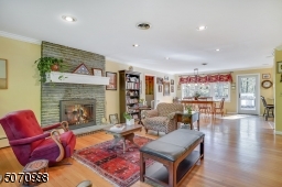Refreshing open floor plan.  Enjoy the wood burning fireplace during diner or relaxing in the living room.
