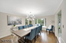 Gorgeous dining room with bay window.