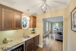 Wet bar leading from the living room to the dining room.