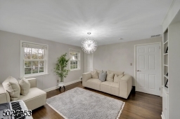 Harwood floors and beautiful built in shelving make for a a perfect bedroom, den or office.
