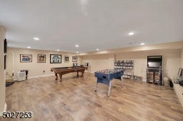Finished lower level with luxury vinyl flooring.