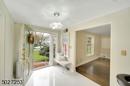 Stunning front entry with new marble floor.
