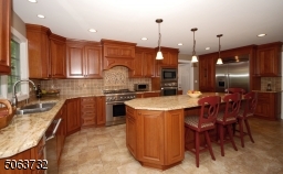 Counter-tops, Roll-outs, Tiled Flooring, & Recessed Lighting.
