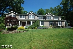 More than 3800 sq ft of living space plus finished basement & 5 car garage.