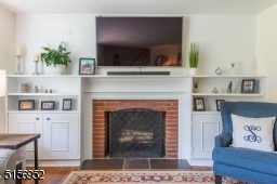 Wood-burning fireplace, built-in shelving