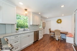 Built-in banquette benches open to provide storage.
