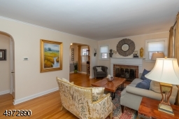 Hardwood floors and wood burning fireplace