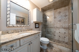 Beautifully renovated main bath with stall shower