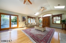 Huge great room off the kitchen, with gas fireplace and sliders to your private and fenced in yard.