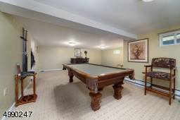 Beautifully finished and heated lower level rec room.