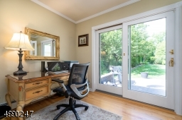 Space for an office with views/sliders to beautiful backyard.
