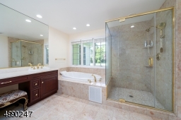 Jetted tub, stall shower and double sinks!