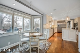 This breakfast nook had been extended to enhance this amazing kitchen.
