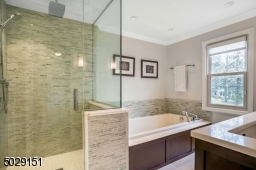It doesn't get better then this! heated floors, Hansgrohe jets & rain shower.  Toto toilet too!