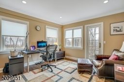 This 1st floor office has a cute balcony attached.  Work from home- and relax too!