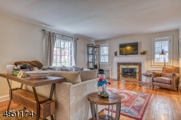 Hardwood flooring and gas fireplace..