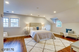 The Master Bedroom suite is on its own level. Spacious bedroom features a sitting area and luxury en suite bath. The bedroom has special sound-proof insulation.