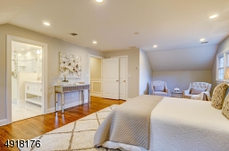 View of sitting area, adjacent bath.