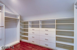 Enjoy a huge walk in closet with custom designed organizers. Available to the Master Suite on the landing of this level is a large laundry room.