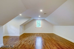 The upper level offers a spacious Bedroom/Office suite with adjacent bath; large walk-in closet plus additional large closet. Terrific bonus space - possible guest suite, rec room, whatever need you may have for it!