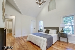 Exquisite master retreat boasts vaulted ceilings, feature lighting, fireplace, walk-in-closet with custom organizers, an extra closet and a unique 3rd fl loft/art/yoga studio in the tower