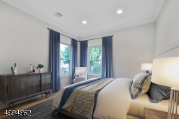 Quiet back bedroom with large double closet (virtually staged)