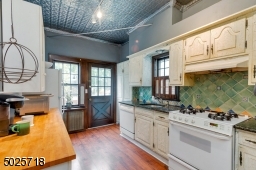 With door leading to back deck and private yard.