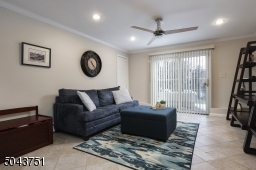 Family Room  - Sliders to backyard, full bathroom.