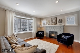 Gas Fireplace. Beautiful Hardwood Floors throughout