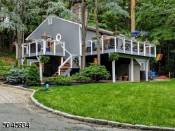 Home floats in the tree line as part of natural surroundings
