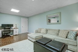 Lower level finished space, perfect for hanging out or home office