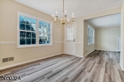 Another view of Dining Rm with door to Deck.