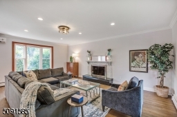 The sizable family room with wood burning marble fireplace is the perfect spot to relax and enjoy.
