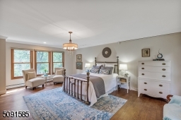 Front to back bedroom has oversized windows for great views and light.