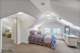 Finished attic suite with tons of extra space and marble bath.