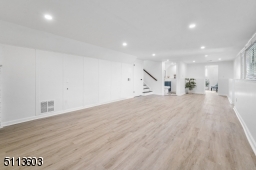 Huge space with wood-burning fireplace can be used as a family room, play room or recreation room!