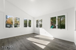 Sun-filled with a vaulted ceiling and exposed brick wall, you will spend four seasons out here!