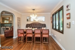 Open to the Kitchen area, the Dining Room accommodates 8+ for meals.