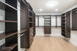 Custom walk in closet in master.