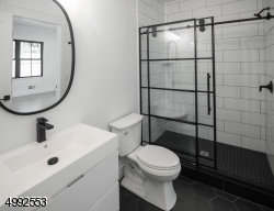 First floor full bathroom - attached to bedroom for possible inlaw suite.
