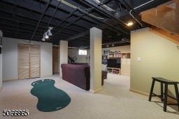 Rec Rm with Exercise area, golf practice area, entertainment area