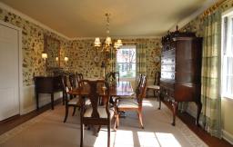 Classically designed formal Dining Room has beautiful trims and moldings
