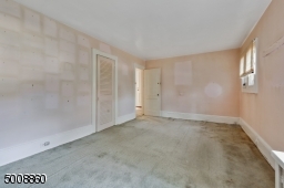 Spacious master bedroom is ready for a little face lift -has tons of potential.